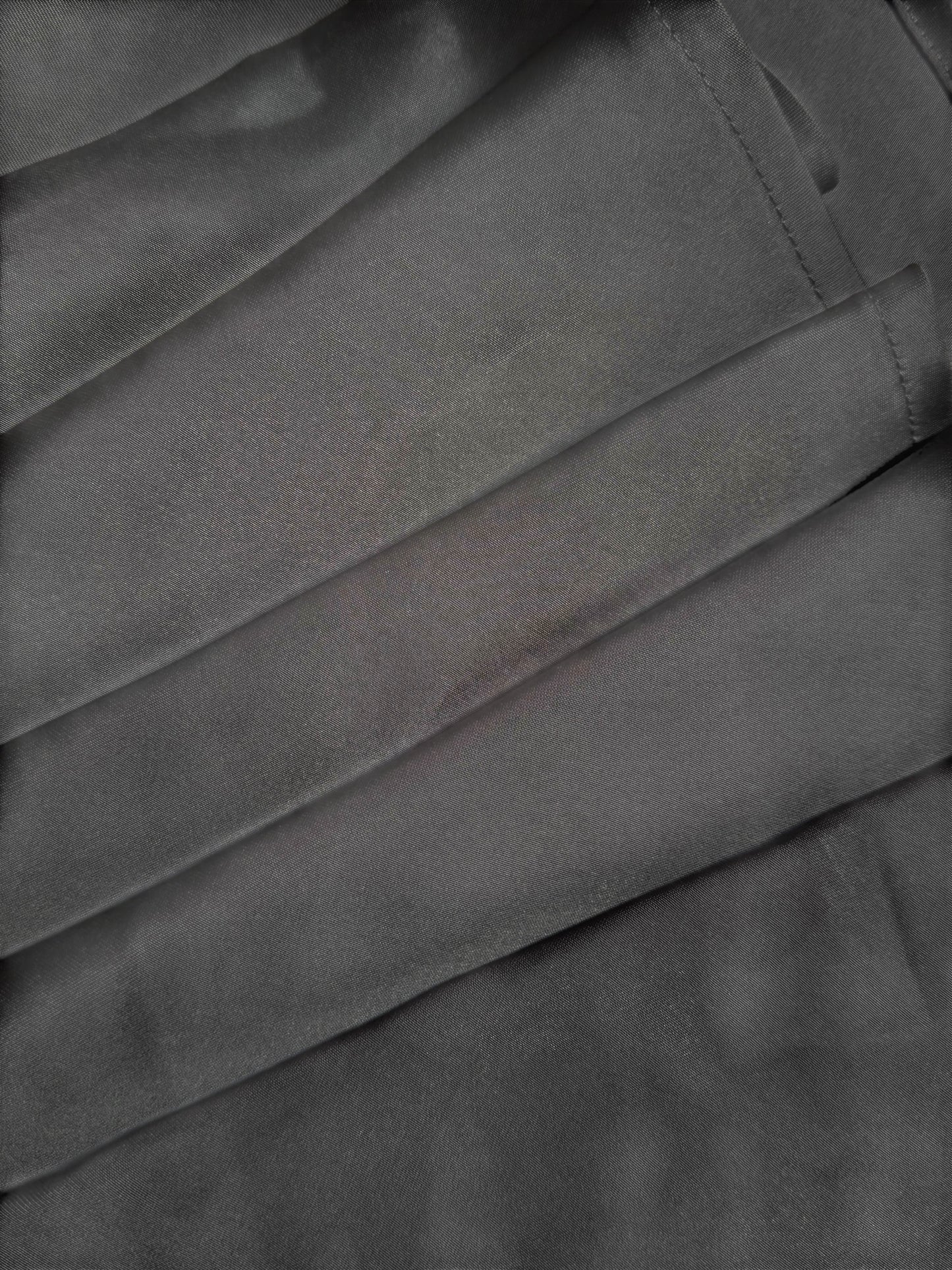 Nesthetics dark grey satin skirt with a flowing drape and luxurious feel.