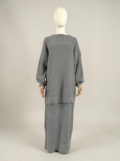 Nesthetics grey knit set with zigzag pattern, featuring balloon sleeves and a midi skirt. Mohair blend.